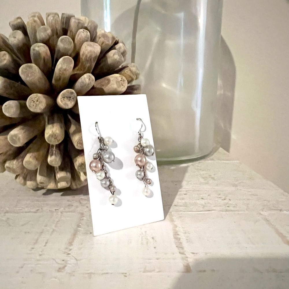 Faux pearl earrings on silver